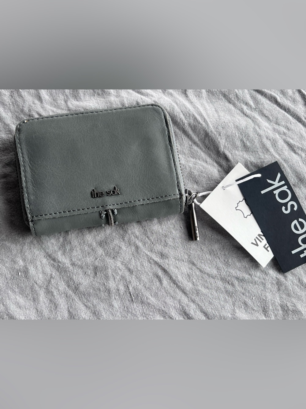 New! The Sak leather zip around wallet in gray - with tags